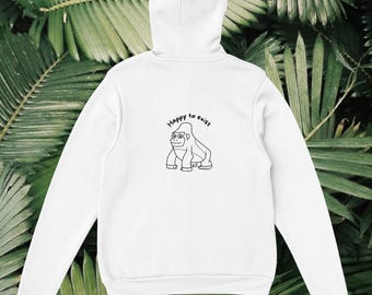 May include: White hooded sweatshirt with a black line drawing of a gorilla wearing glasses and the text "Happy to exist" on the back.