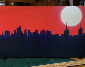Silhueta da cidade à noite em tons de vermelho, painel de fundo de 76 cm x 40 cm para exibição de figuras de ação.