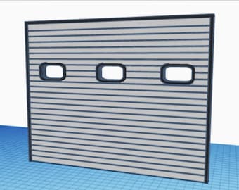 May include: A gray garage door with three rectangular windows. The door is made of horizontal slats.