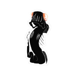 May include: A black sticker depicting a stylized creature with a long, curved body and large, orange eyes. The creature has white claw-like markings on its body.