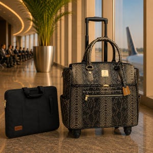 May include: A black and gold rolling suitcase with a snakeskin pattern, a black laptop case, and a handle. The suitcase has a gold zipper and a small tag. The background shows an airport terminal with a large plant and a row of people.