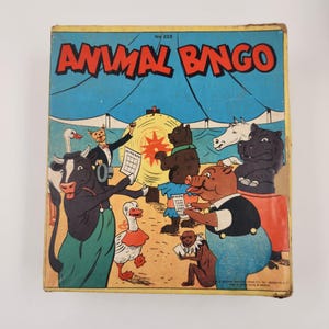 Vintage dierenbingospel met spinnewiel - kartonnen bingokaarten en nummercovers