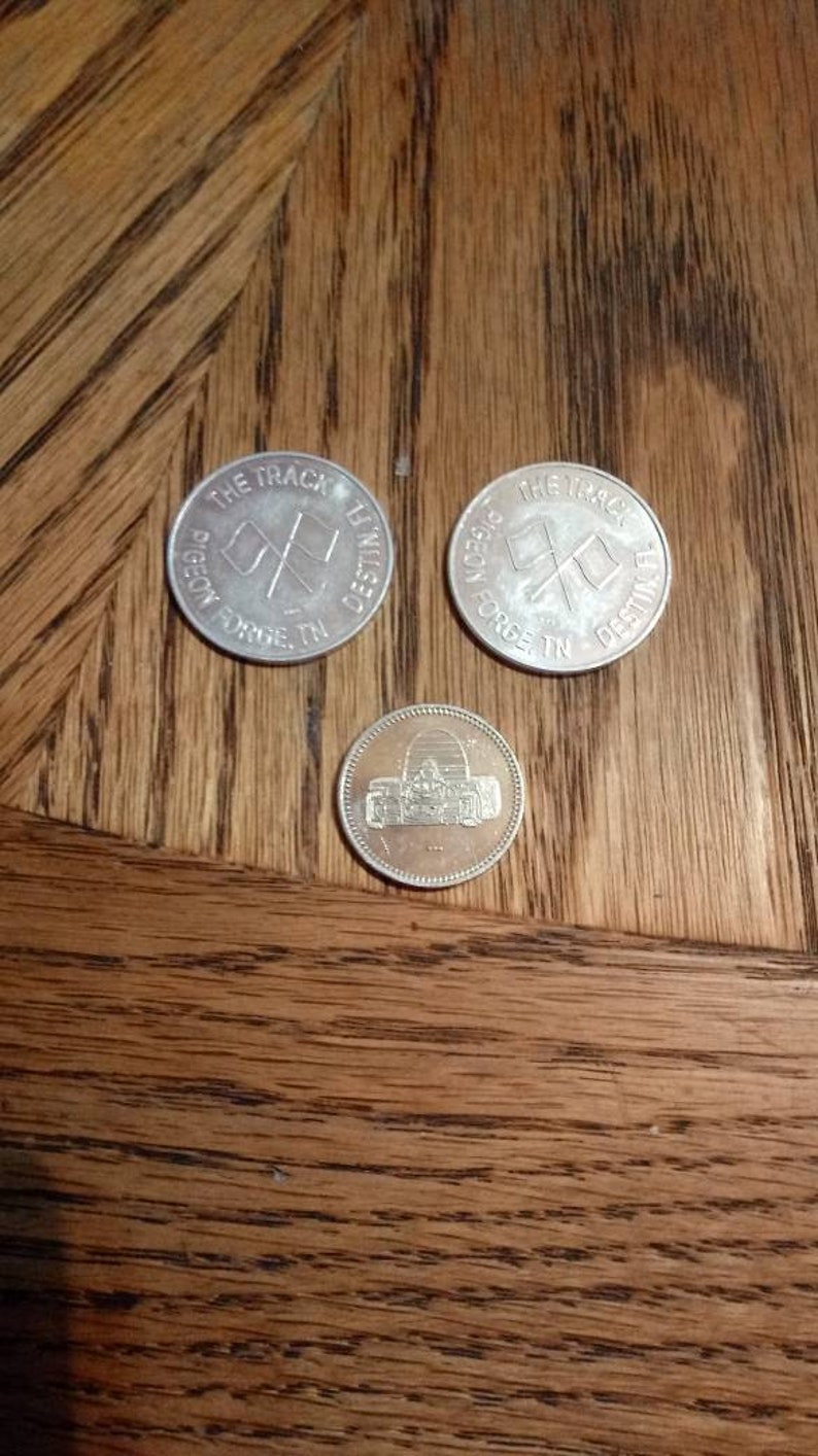 1 unmarked,Token Collectible,Coin collectible,Racing Collectible FL 3 Amusement Tokens Go Kart 2 The Track Pigeon Forge,Tn,Destin