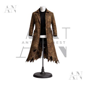 May include: A distressed brown leather coat with a tattered hemline and a black shirt underneath. The coat is displayed on a mannequin, showcasing its long length and textured appearance. The coat has two pockets and a collar.