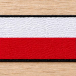 May include: A rectangular embroidered patch featuring the flag of Poland, which consists of two horizontal bands of equal height, with white on the top and red on the bottom, finished with a thick black stitched border around the entire edge.