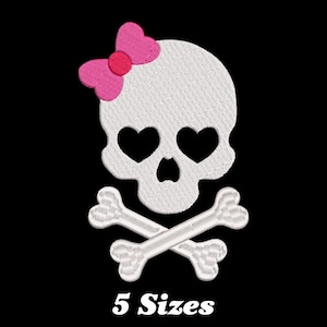 May include: White skull with pink bow and heart-shaped eyes, crossed bones, and the text "5 Sizes".