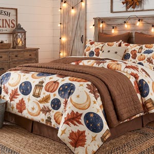 May include: A bedding set featuring a cream-coloured comforter with a pattern of orange pumpkins, brown autumn leaves, dark blue starry circles, golden crescent moons, and lanterns. The set includes a solid brown quilted coverlet and bed skirt.