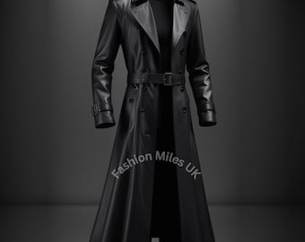 May include: A black leather trench coat with a double-breasted design, a belt at the waist, and a long, flowing skirt. The coat has a classic collar and button details. The text "Fashion Miles UK" is visible on the coat.