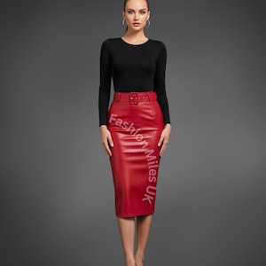 May include: A red pencil skirt with a matching belt and a black long-sleeve top. The skirt has a fitted silhouette and a buckle belt. The text "Fashion Miles UK" is printed on the skirt.