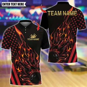 May include: A black polo shirt featuring a graphic of bowling pins and a ball engulfed in orange and yellow flames. The design includes red stars on the side, the text "YOUR NAME" on the front, and "TEAM NAME" on the back. The shirt has a collar.