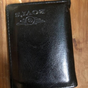Cartera de piel negra para tarjetas