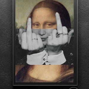 May include: Framed art print featuring a humorous parody of the Mona Lisa. The artwork depicts the iconic figure giving the middle finger with both hands. The image is a black and white photograph with a black frame.