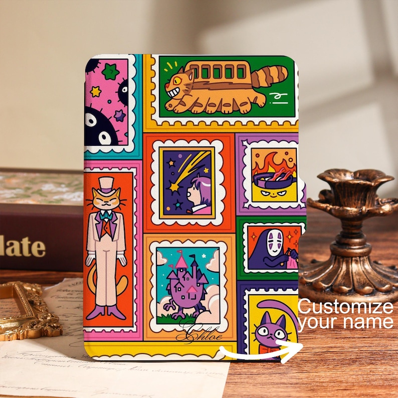 May include: A colorful phone case featuring a collage of cartoon illustrations in a postage stamp design. The artwork includes a cat in a top hat, a bus-like creature, and other whimsical characters. The text "Customize your name" is also visible.