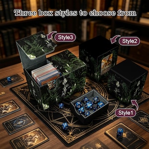 May include: Three deck boxes with a dark forest print and the text 'Three box styles to choose from', 'Style1', 'Style2', and 'Style3'. One box is open, revealing a deck of cards. A small tray contains several blue polyhedral dice.