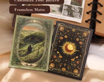 May include: Two decorative cards with illustrations. One features a hobbit hole scene in green tones, the other a sun and moon design with floral elements on a black background. The text "Customize your pattern" and "Frameless Matte" is also visible.