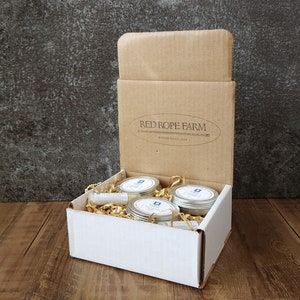 Balm Box, with Skin, Foot and Sore Muscle Balm and Lip Exfoliator and Your Choice of Lip Balm