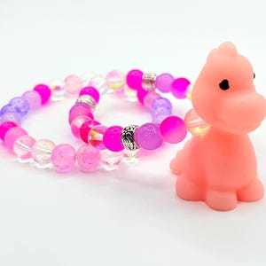 Color Therapy—Psychedelic Pink Dino Squishie Bracelet Stack – Rave Kandi Bracelet Set – Kawaii Pastelcore Jewelry – Weird Girl Energy Gift