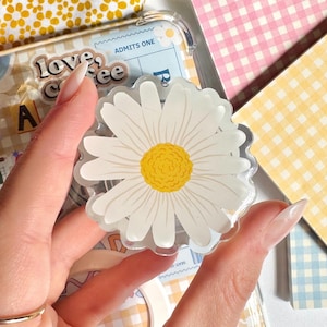Floral daisy MagSafe grip with color-matching base – perfect for book lovers and phones