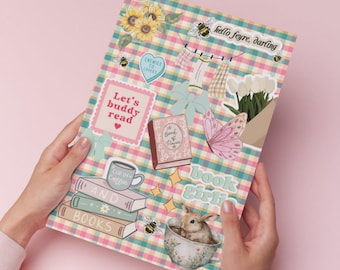 May include: A decorative paper sheet with a colorful plaid pattern, featuring illustrations of books, flowers, bees, and a rabbit in a teacup. Text includes "hello feyre, darling", "Let's buddy read", and "book girl".