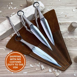 Hand-Forged Throwing Knife Set 3-Piece – Carbon Steel, Paracord-Wrapped Handles, Balanced for Precision Throwing, Leather Case Included.