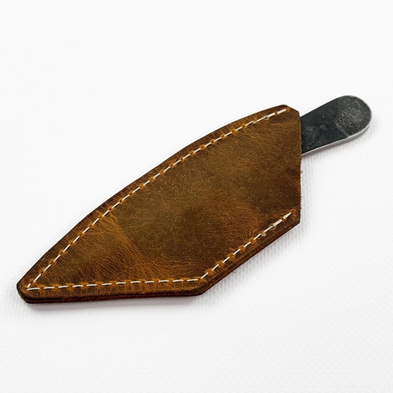 Kiridashi in a stitched leather sheath.