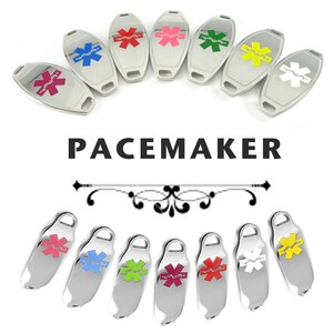 May include: A set of ten silver medical alert tags with a red, pink, green, yellow, blue, and white star of life symbol. The tags are engraved with the word "PACEMAKER".