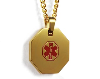 May include: Gold chain necklace with a gold octagonal pendant featuring a red medical symbol.