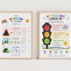 May include: Two framed educational posters. One titled "My Window of Tolerance" with a rainbow, sun, and volcano illustration. The other, "My Feelings Check-In," features a traffic light with red, yellow, and green lights, and text.