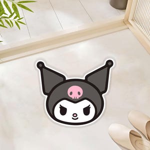 Whimsical Hooded Character Rug Featuring Pointed Ears and Pink Skull Design Polyester Rug