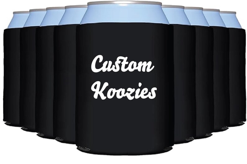 May include: Ten black can coolers with a white inscription that reads "Custom Koozies".