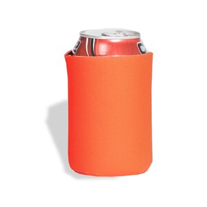 May include: Orange neoprene can cooler. The cooler is designed to fit a standard 12-ounce can.