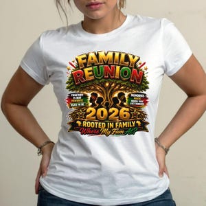 May include: A white t-shirt featuring a graphic design with a large tree, silhouettes of people, and the text "FAMILY REUNION 2026 ROOTED IN FAMILY Where My Fam At?" along with "TOGETHER IS OUR FAVORITE PLACE TO BE" and "MEMORIES MADE BONDS THAT LAST FOREVER."