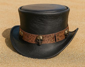 May include: A black top hat with a brown band featuring skull accents. The hat has a wide brim and a textured appearance. The band is adorned with small, metallic skulls and rivets. This hat is a stylish accessory.