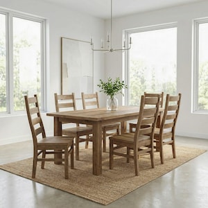 May include: A rectangular light brown wooden dining table with four matching ladder-back chairs arranged around it. The table features a smooth top and sturdy legs, while the chairs have horizontal slats on the backrests and solid wooden seats.