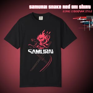 May include: Black t-shirt with a red graphic featuring a samurai mask, snake, and crossed swords. The word "SAMURAI" is printed in white. Text at the top reads "SAMURAI SNAKE RED ONI SHIRT" and "ICONIC CYBERPUNK STYLE".