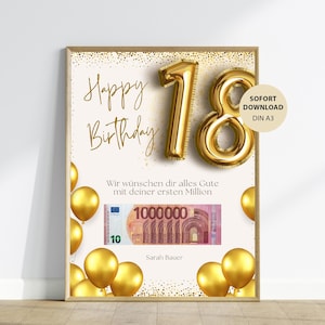 Op de afbeelding: Een ingelijste verjaardagsafdruk met gouden folie accenten. De woorden "Happy Birthday" zijn in elegant schrift geschreven boven een gouden 18-folieballon. Een gouden folieballoncluster en een nep Euro-biljet zijn ook te zien.