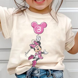 May include: A rectangular wooden sign with the words "Welcome to our home" in a handwritten font. The sign has a distressed finish, giving it a rustic appearance, and is designed to welcome guests.