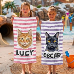 May include: Two beach towels with cat portraits. One towel has a red and white striped pattern with an orange tabby cat and the name "LUCY". The other towel has a purple and white striped pattern with a black cat and the name "OSCAR".