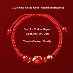 Puede incluir: Una pulsera de cordón trenzado rojo con tres cuentas rojas con símbolos dorados y dos cuentas rojas más pequeñas en los extremos. El texto dice: 2027 Year Of the Goat - Guardian Bracelet, Best for Zodiac Signs: Goat, Rat, Ox, Dog, Temple-Blessed Quality.