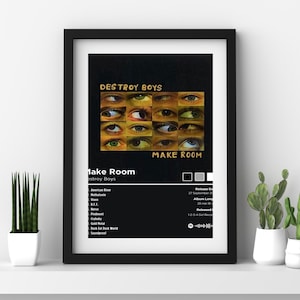 Może przedstawiać: Czarny plakat w ramie z okładką albumu "Make Room" zespołu Destroy Boys. Grafika zawiera kolaż oczu i tytuł albumu. Plakat zawiera również listę utworów i szczegóły albumu.