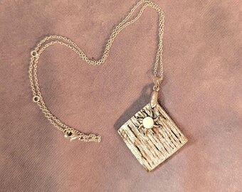 Cherry Wood Necklace: Sun Charm, Silver Plated Chain, symbolizing love and romance