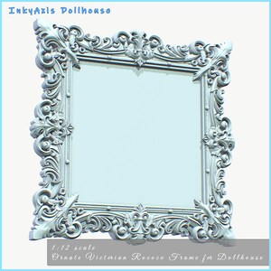 May include: A pale blue, highly detailed Victorian Rococo frame for a dollhouse. The square frame features elaborate scroll and floral designs. The text "InkyAxis Dollhouse" is at the top, and "1:12 scale Ornate Victorian Rococo Frame for Dollhouse" is at the bottom.