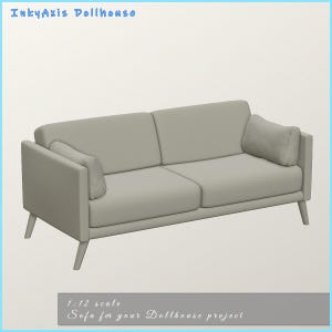 May include: A light grey sofa with two cushions, designed for a dollhouse. The sofa has a simple, modern design with wooden legs.