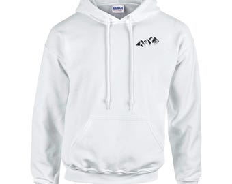 May include: A white hooded sweatshirt with a front pocket and drawstring. The sweatshirt features a small black mountain range graphic on the upper left chest. The brand name "Gildan" is visible on the tag.