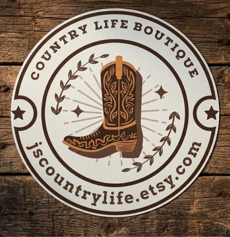 May include: A round sticker with a brown and tan cowboy boot design. The text "COUNTRY LIFE BOUTIQUE" is in a circular pattern around the boot. The Etsy shop name "jscountrylife.etsy.com" is also included.