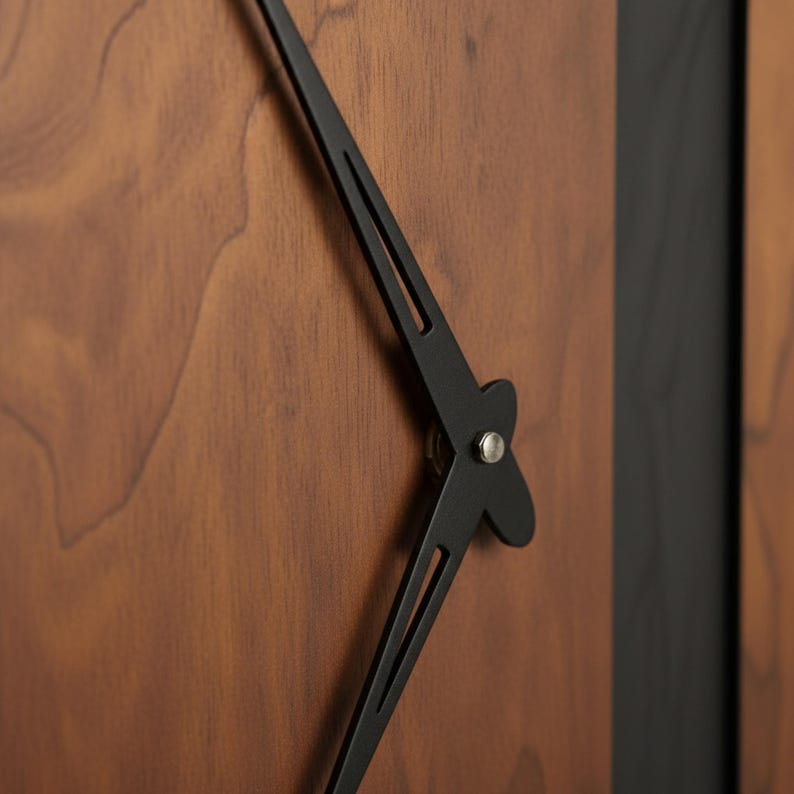 May include: Close-up of a modern wall clock with a dark wood grain face and black hands. The clock hands are thin and elegant, with a minimalist design. The clock face has a natural wood finish.
