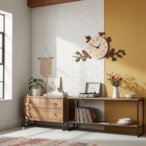 May include: A wooden bird-themed wall clock with a light-colored face and black hands. The clock is surrounded by wooden birds and branches. The clock is mounted on a white brick wall. A wooden console table and dresser are in the foreground.