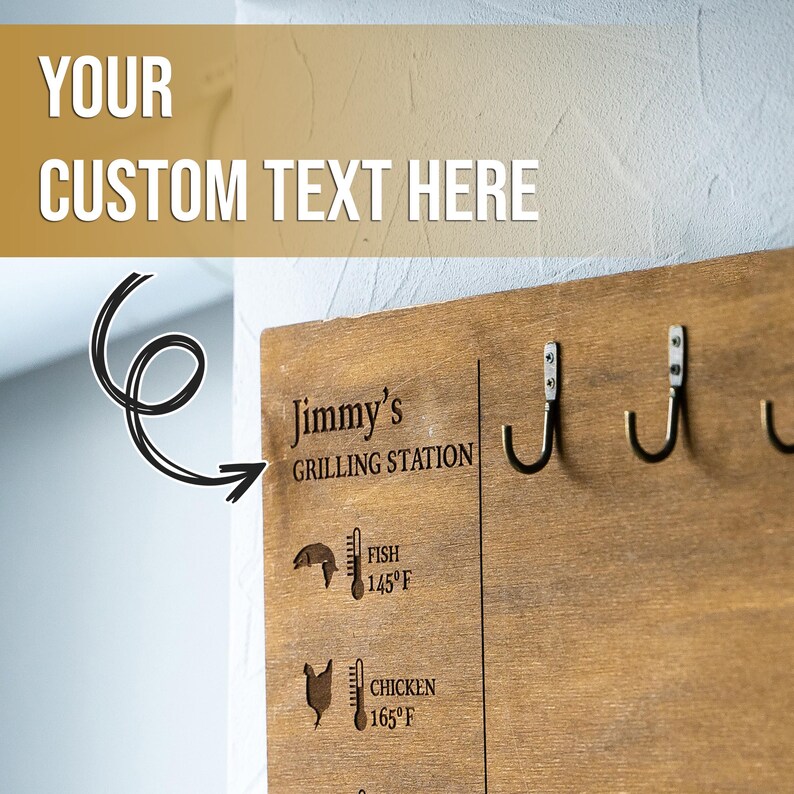 May include: Wooden grilling station sign with hooks, a thermometer, and a fish and chicken icon. The sign says "Jimmy's Grilling Station" and includes the internal cooking temperatures for fish and chicken.