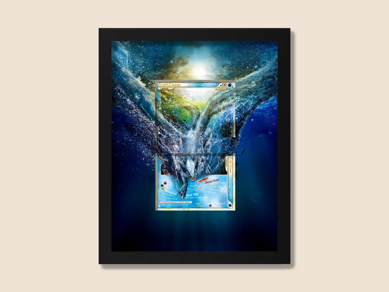 May include: Framed artwork featuring a stylized image of a trading card submerged in water. The card has a blue and white design with text. The background shows a dynamic splash of water and a bright light source, creating a dramatic effect.
