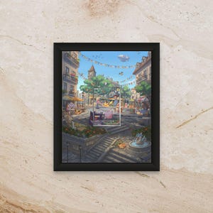 Puede incluir: Obra de arte enmarcada que representa una animada plaza de la ciudad europea con una torre del reloj, tiendas y personas. Una tarjeta coleccionable es visible en el centro. La obra está en un marco negro y montada en una pared beige texturizada.